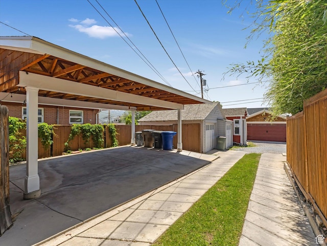218 E Fifth Ave, Salt Lake City, UT 84103 - view of vehicle parking featuring a carport