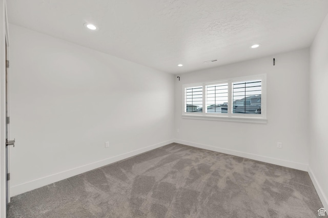 2279 E Ravine Rock Way, Draper, UT 84020 - empty room with carpet floors, recessed lighting, baseboards, and a textured ceiling