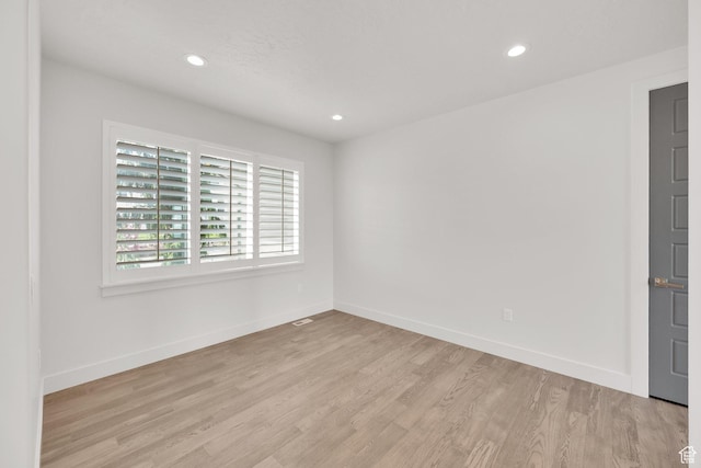 2279 E Ravine Rock Way, Draper, UT 84020 - empty room featuring light wood-type flooring, baseboards, and recessed lighting