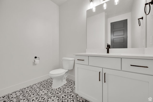2279 E Ravine Rock Way, Draper, UT 84020 - half bathroom featuring baseboards, toilet, vanity, and tile patterned flooring