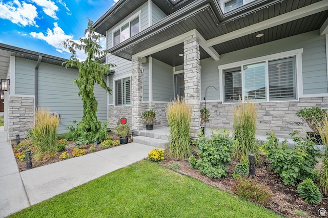 2279 E Ravine Rock Way, Draper, UT 84020 - view of exterior entry with stone siding and a porch