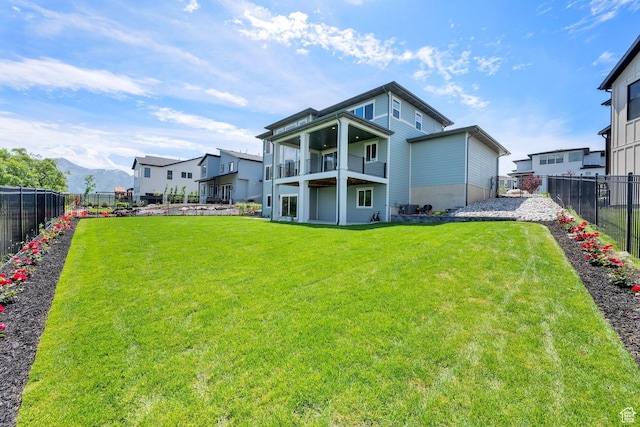 2279 E Ravine Rock Way, Draper, UT 84020 - back of house with a balcony and a mountain view