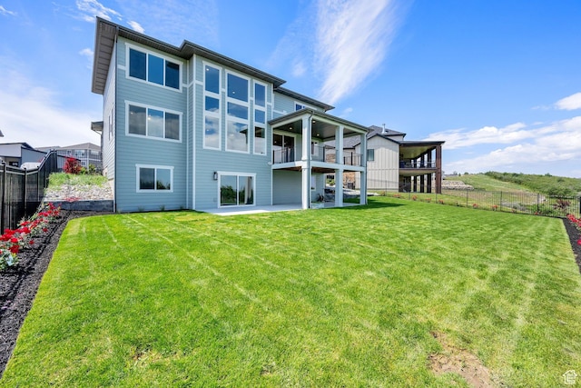 2279 E Ravine Rock Way, Draper, UT 84020 - back of property featuring a balcony and a patio