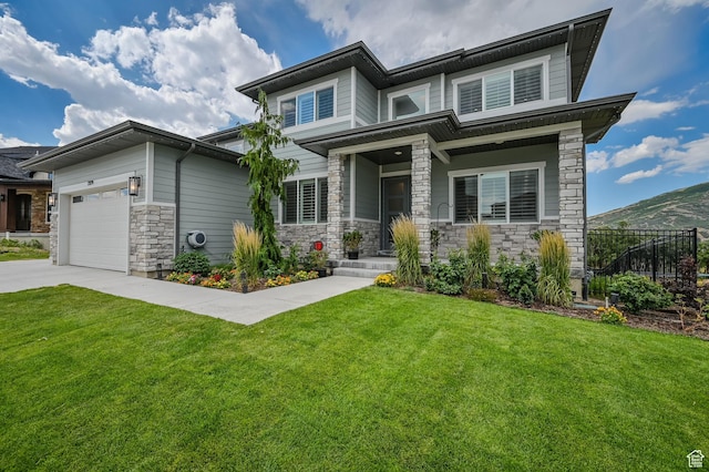 2279 E Ravine Rock Way, Draper, UT 84020 - prairie-style house with stone siding, driveway, and an attached garage