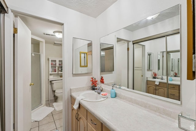 1044 E Quail Park Dr S Unit C, Millcreek, UT 84117 - full bath featuring a shower stall, vanity, toilet, and a textured ceiling