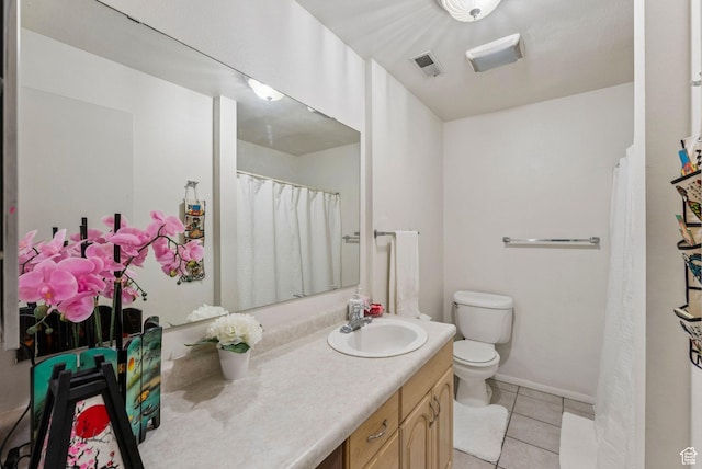 1044 E Quail Park Dr S Unit C, Millcreek, UT 84117 - bathroom featuring vanity, toilet, tile patterned flooring, and baseboards