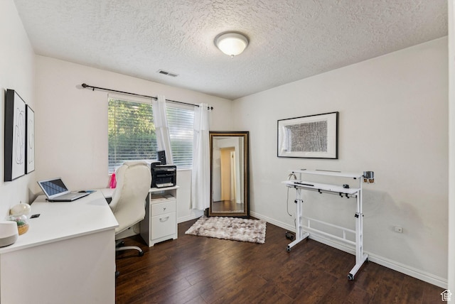 1044 E Quail Park Dr S Unit C, Millcreek, UT 84117 - office space featuring dark wood-style floors, a textured ceiling, and baseboards