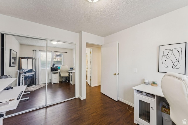 1044 E Quail Park Dr S Unit C, Millcreek, UT 84117 - home office featuring dark wood finished floors, a textured ceiling, and baseboards