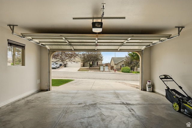 1447 S Southern View Dr, Cedar City, UT 84720 - garage featuring a garage door opener and baseboards