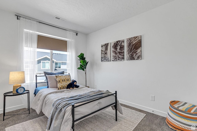 1323 S 3540 E, Spanish Fork, UT 84660 - carpeted bedroom featuring baseboards and a textured ceiling