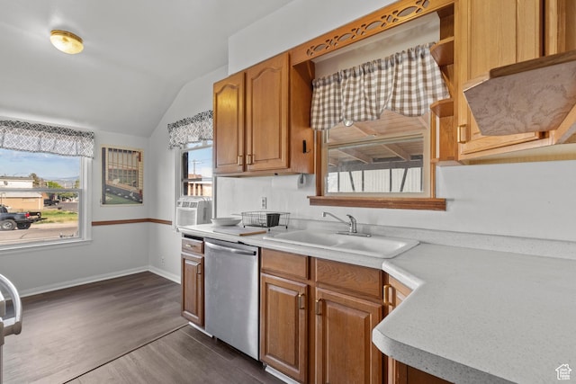 105 N 100 W, Richfield, UT 84701 - kitchen featuring stainless steel dishwasher, a sink, vaulted ceiling, light countertops, and dark wood-style flooring