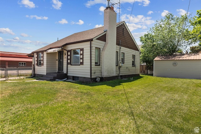 105 N 100 W, Richfield, UT 84701 - rear view of property featuring a chimney and roof with shingles