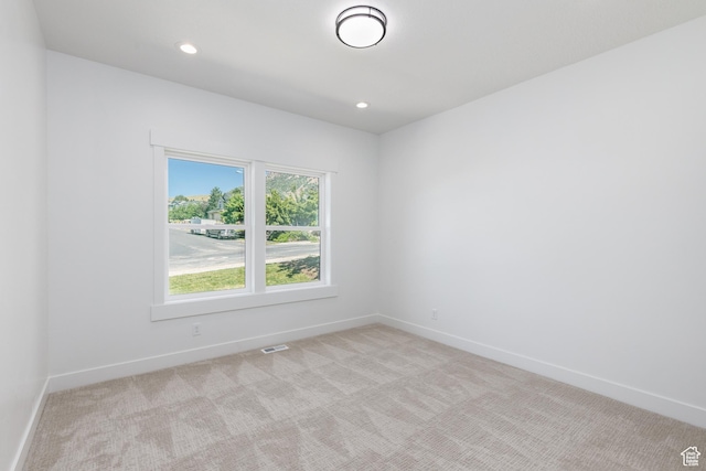3616 N 600 E, North Ogden, UT 84414 - spare room featuring light colored carpet, baseboards, and recessed lighting