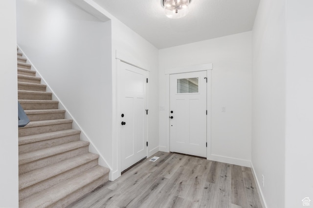 3616 N 600 E, North Ogden, UT 84414 - entryway with stairway, light wood finished floors, and baseboards