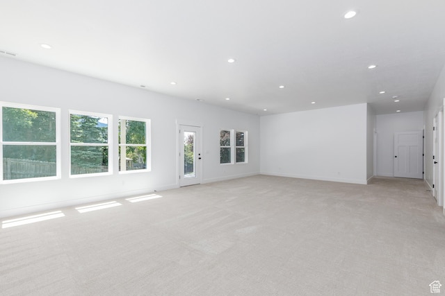 3616 N 600 E, North Ogden, UT 84414 - unfurnished living room with light carpet, recessed lighting, and baseboards