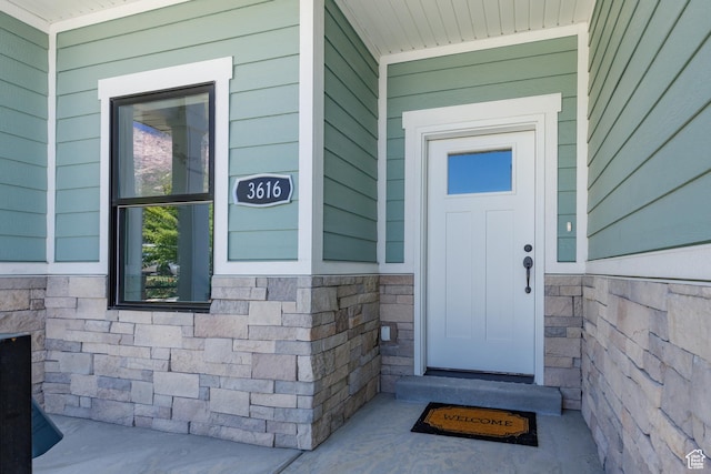 3616 N 600 E, North Ogden, UT 84414 - entrance to property featuring covered porch and stone siding