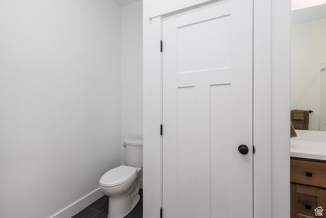 3616 N 600 E, North Ogden, UT 84414 - bathroom with baseboards, vanity, and toilet