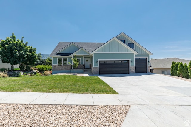 3616 N 600 E, North Ogden, UT 84414 - craftsman inspired home with board and batten siding, a garage, concrete driveway, a front yard, and stone siding