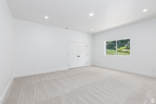3616 N 600 E, North Ogden, UT 84414 - unfurnished bedroom with light carpet, recessed lighting, baseboards, and a closet