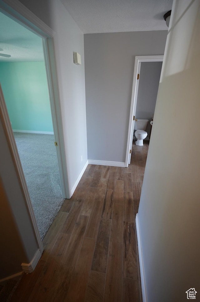 2881 N 450 E, North Ogden, UT 84414 - hallway featuring dark wood-type flooring and baseboards