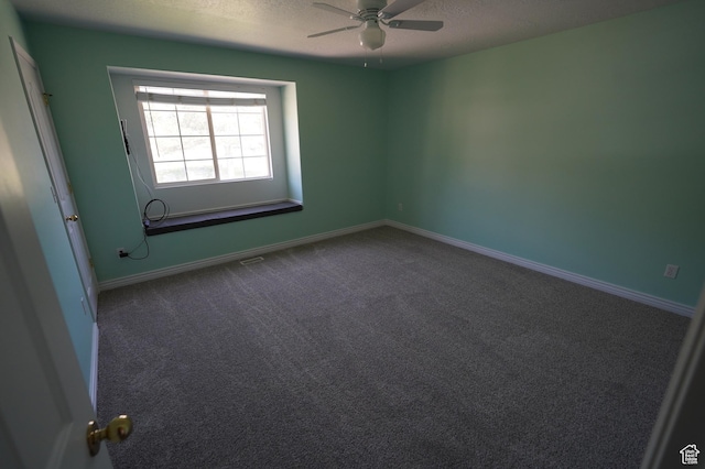 2881 N 450 E, North Ogden, UT 84414 - unfurnished room with a textured ceiling, a ceiling fan, dark carpet, and baseboards