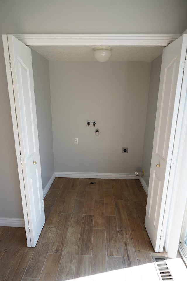 2881 N 450 E, North Ogden, UT 84414 - washroom with hookup for an electric dryer, wood finished floors, hookup for a washing machine, and baseboards