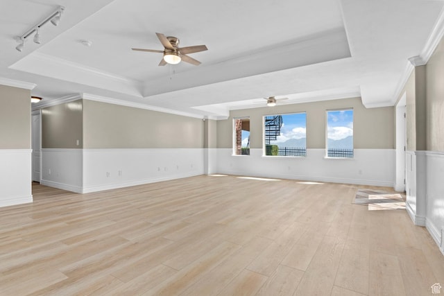 14709 S Cedar Knoll Cir, Herriman, UT 84096 - empty room with a raised ceiling, ceiling fan, light wood-type flooring, crown molding, and track lighting
