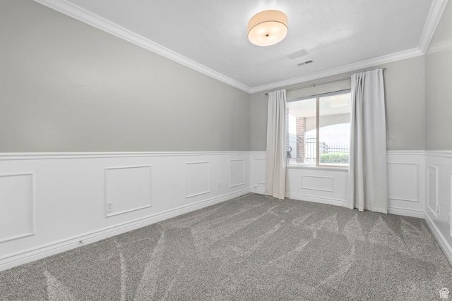 14709 S Cedar Knoll Cir, Herriman, UT 84096 - carpeted spare room featuring ornamental molding, wainscoting, and a decorative wall