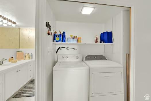 1785 29th St Unit 504, Ogden, UT 84403 - laundry room featuring washer and clothes dryer