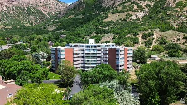1785 29th St Unit 504, Ogden, UT 84403 - aerial view of a mountain backdrop and apartment complex / building