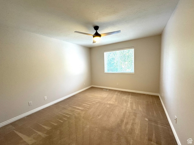 362 S Glen Cir E, Fruit Heights, UT 84037 - spare room featuring carpet floors, a ceiling fan, and baseboards