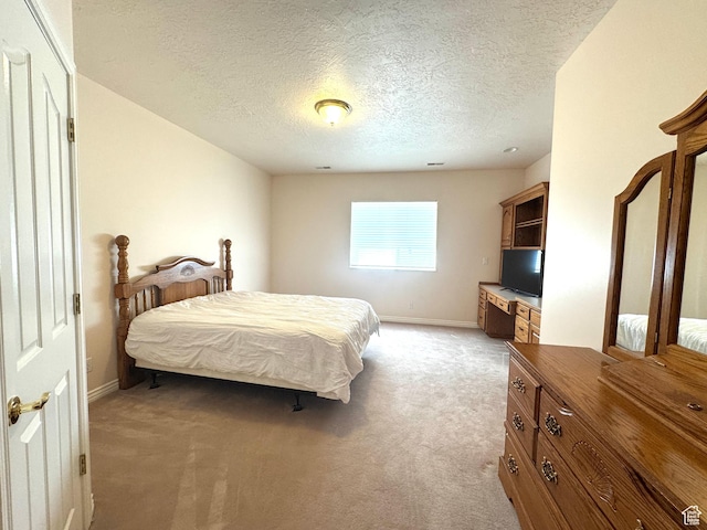 362 S Glen Cir E, Fruit Heights, UT 84037 - bedroom with light colored carpet, a textured ceiling, and baseboards