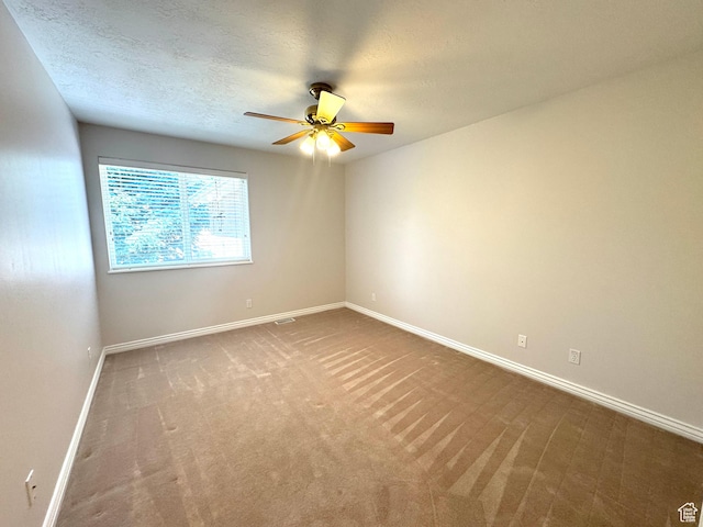 362 S Glen Cir E, Fruit Heights, UT 84037 - carpeted empty room featuring ceiling fan, baseboards, and a textured ceiling
