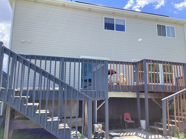 781 E Valley View Dr, Tooele, UT 84074 - rear view of property featuring stairway and a wooden deck