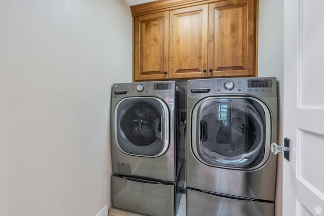 719 E Hampton Ct N, Alpine, UT 84004 - washroom featuring washer and clothes dryer, cabinet space, and baseboards