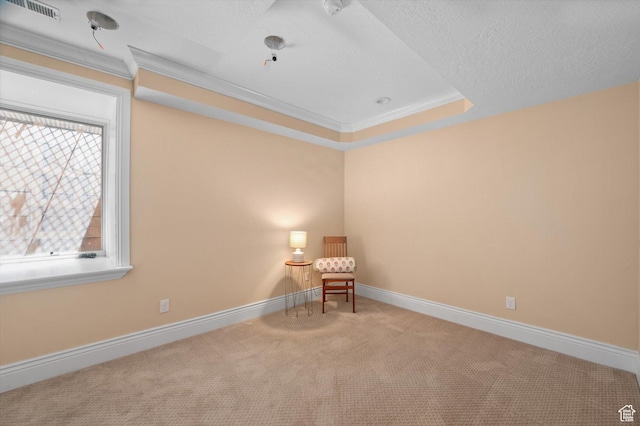 521 E 900 S, Salt Lake City, UT 84105 - unfurnished room with carpet flooring, ornamental molding, baseboards, a textured ceiling, and a raised ceiling