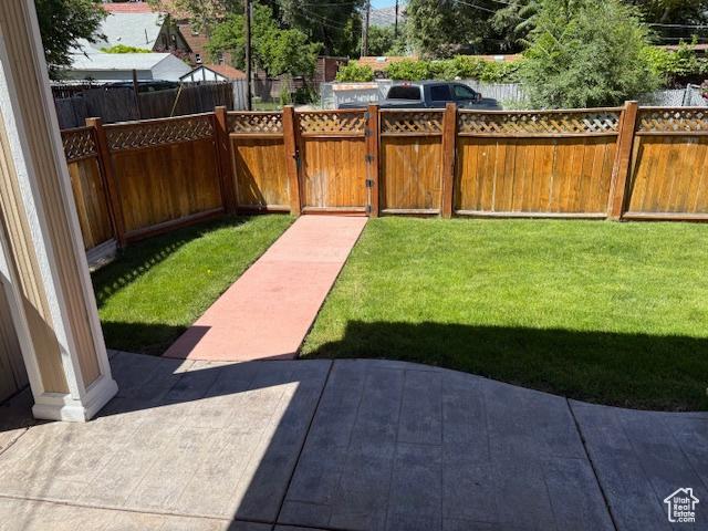 521 E 900 S, Salt Lake City, UT 84105 - view of yard featuring a gate and a patio