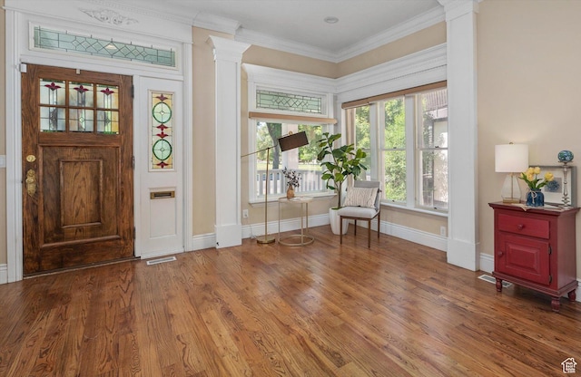521 E 900 S, Salt Lake City, UT 84105 - entryway with ornate columns, ornamental molding, wood finished floors, and baseboards