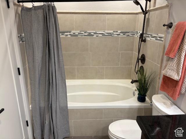 521 E 900 S, Salt Lake City, UT 84105 - full bath with toilet, tiled shower / bath combo, and vanity