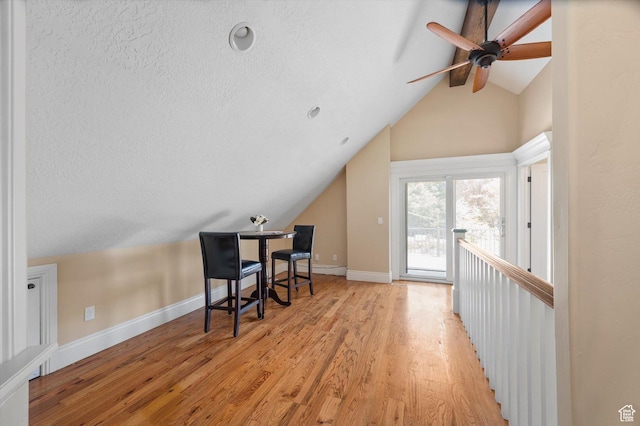 521 E 900 S, Salt Lake City, UT 84105 - home office with lofted ceiling, ceiling fan, baseboards, light wood-style floors, and a textured ceiling