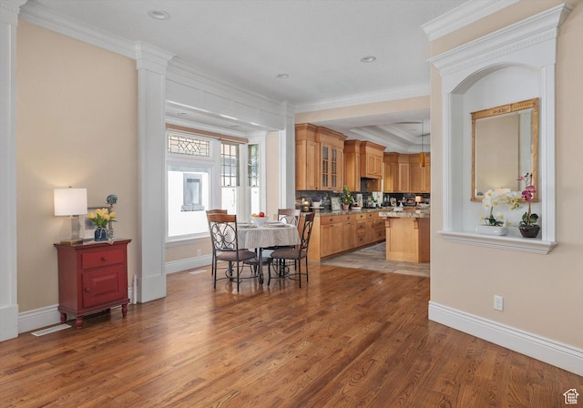 521 E 900 S, Salt Lake City, UT 84105 - dining room featuring wood finished floors, ornamental molding, baseboards, decorative columns, and recessed lighting