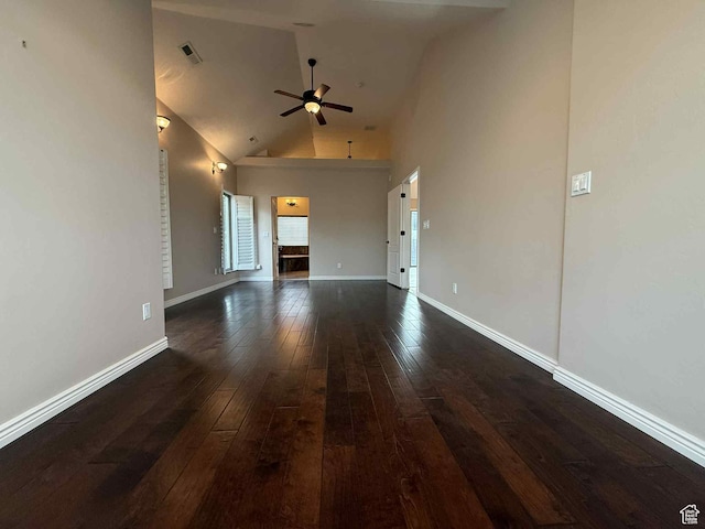 639 N 1550 E, Price, UT 84501 - unfurnished living room featuring dark wood-style flooring, high vaulted ceiling, a ceiling fan, and baseboards