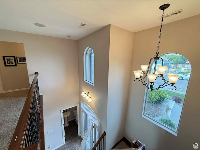 639 N 1550 E, Price, UT 84501 - stairway with a chandelier and baseboards