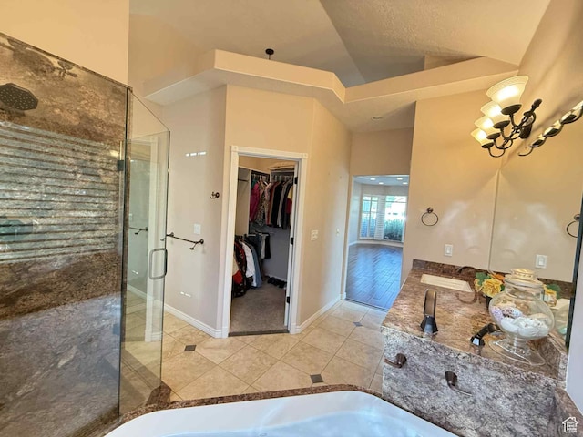 639 N 1550 E, Price, UT 84501 - full bath with a shower stall, tile patterned floors, a spacious closet, double vanity, and a bath