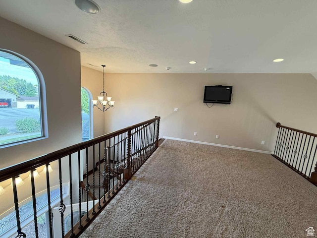 639 N 1550 E, Price, UT 84501 - corridor featuring a chandelier, carpet floors, baseboards, recessed lighting, and an upstairs landing