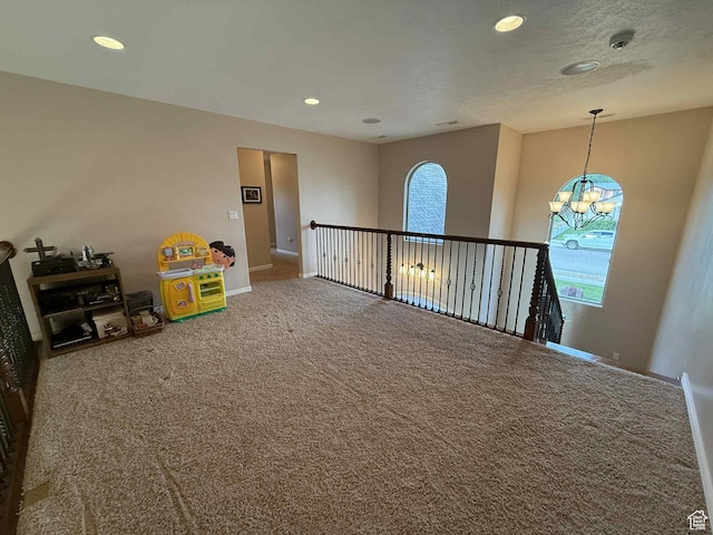 639 N 1550 E, Price, UT 84501 - recreation room featuring carpet, baseboards, recessed lighting, and a chandelier