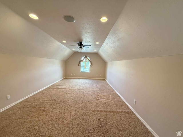 639 N 1550 E, Price, UT 84501 - additional living space with carpet floors, vaulted ceiling, baseboards, recessed lighting, and a textured ceiling