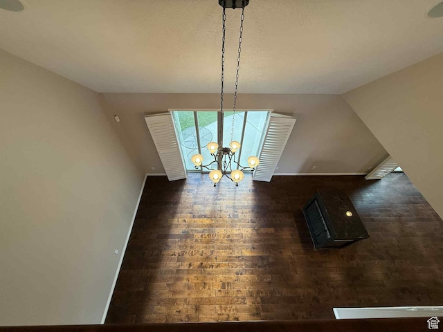 639 N 1550 E, Price, UT 84501 - unfurnished dining area with wood-type flooring and a chandelier