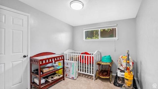 850 N Monroe Blvd E, Ogden, UT 84404 - bedroom with a nursery area and carpet flooring
