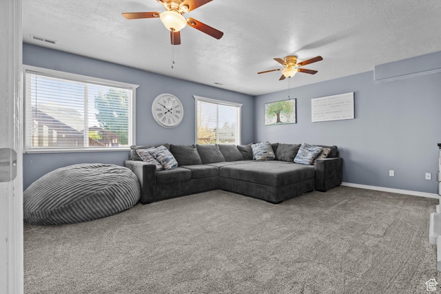 2456 W 1600 N, Clinton, UT 84015 - living area with ceiling fan, carpet flooring, a textured ceiling, and baseboards